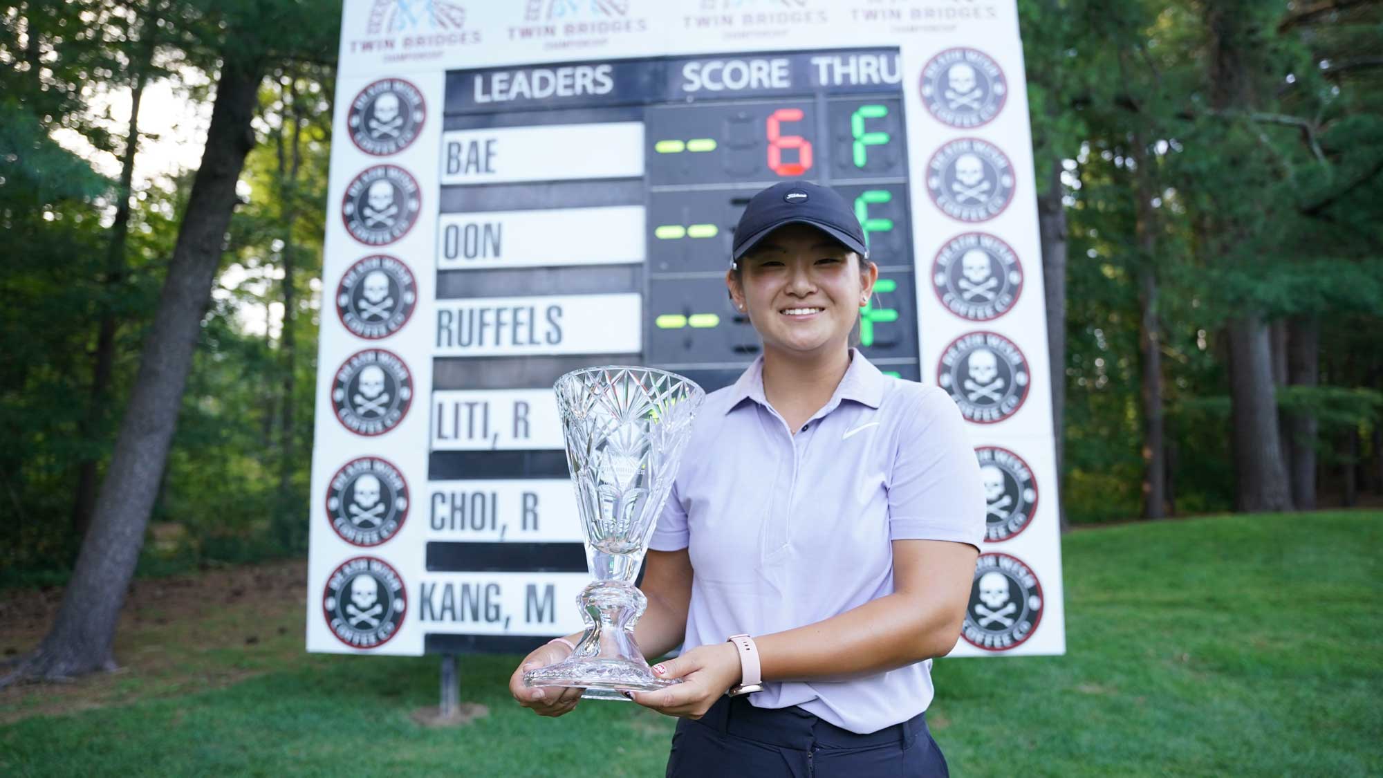 Jenny Bae with the trophy