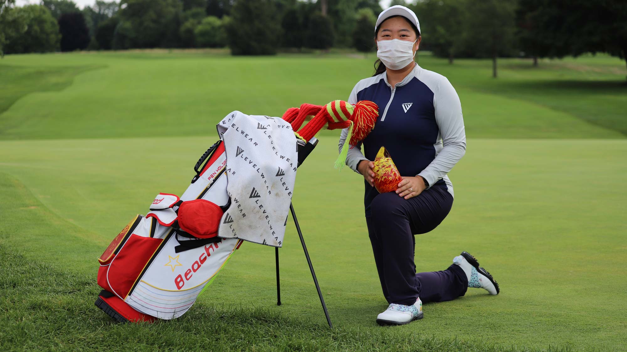 Ruixin Liu with FireKeepers trophy and her bag