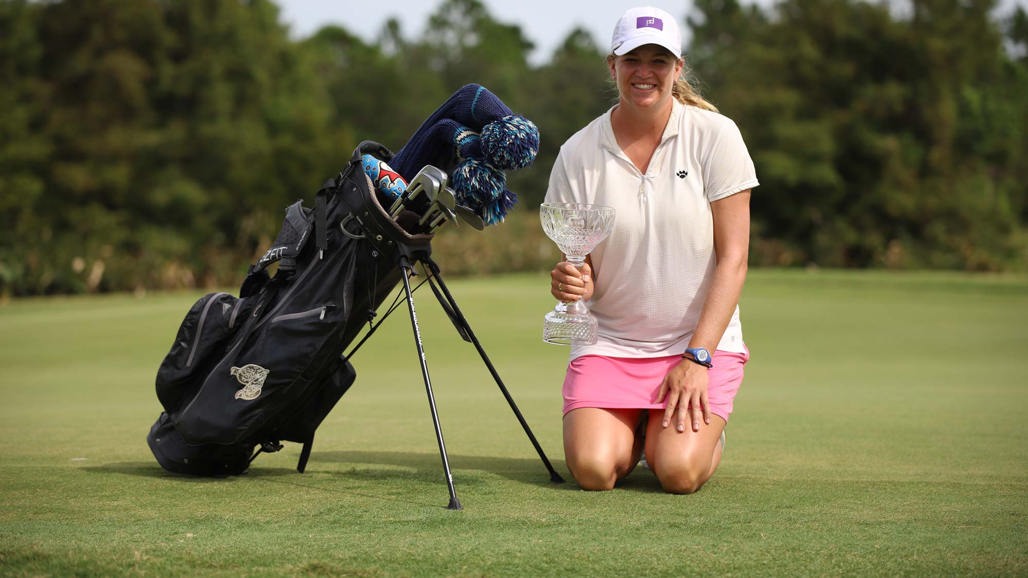 Laura Wearn with trophy and bag