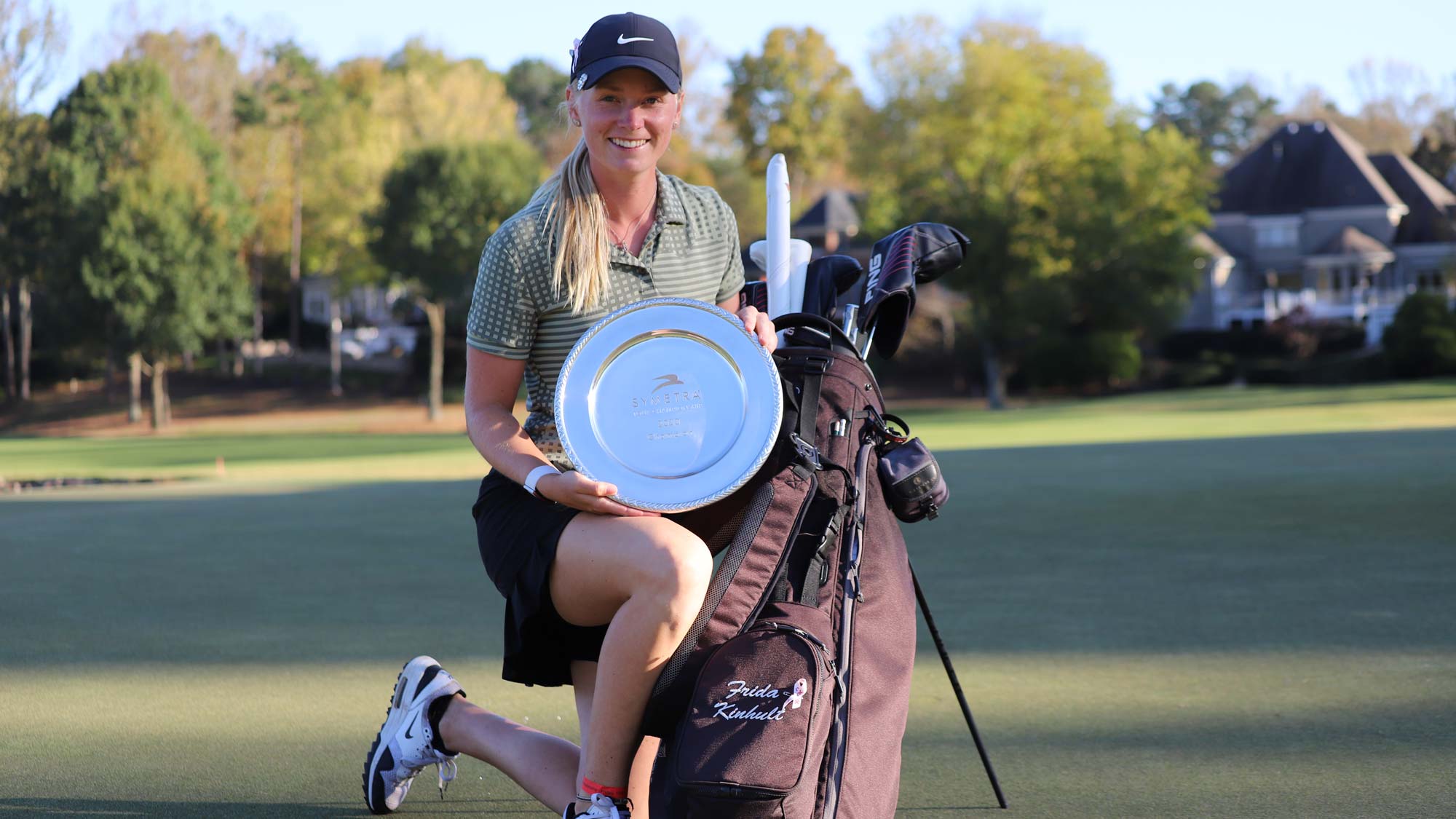Frida Kinhult with Trophy and Bag 2020 Tour Champ