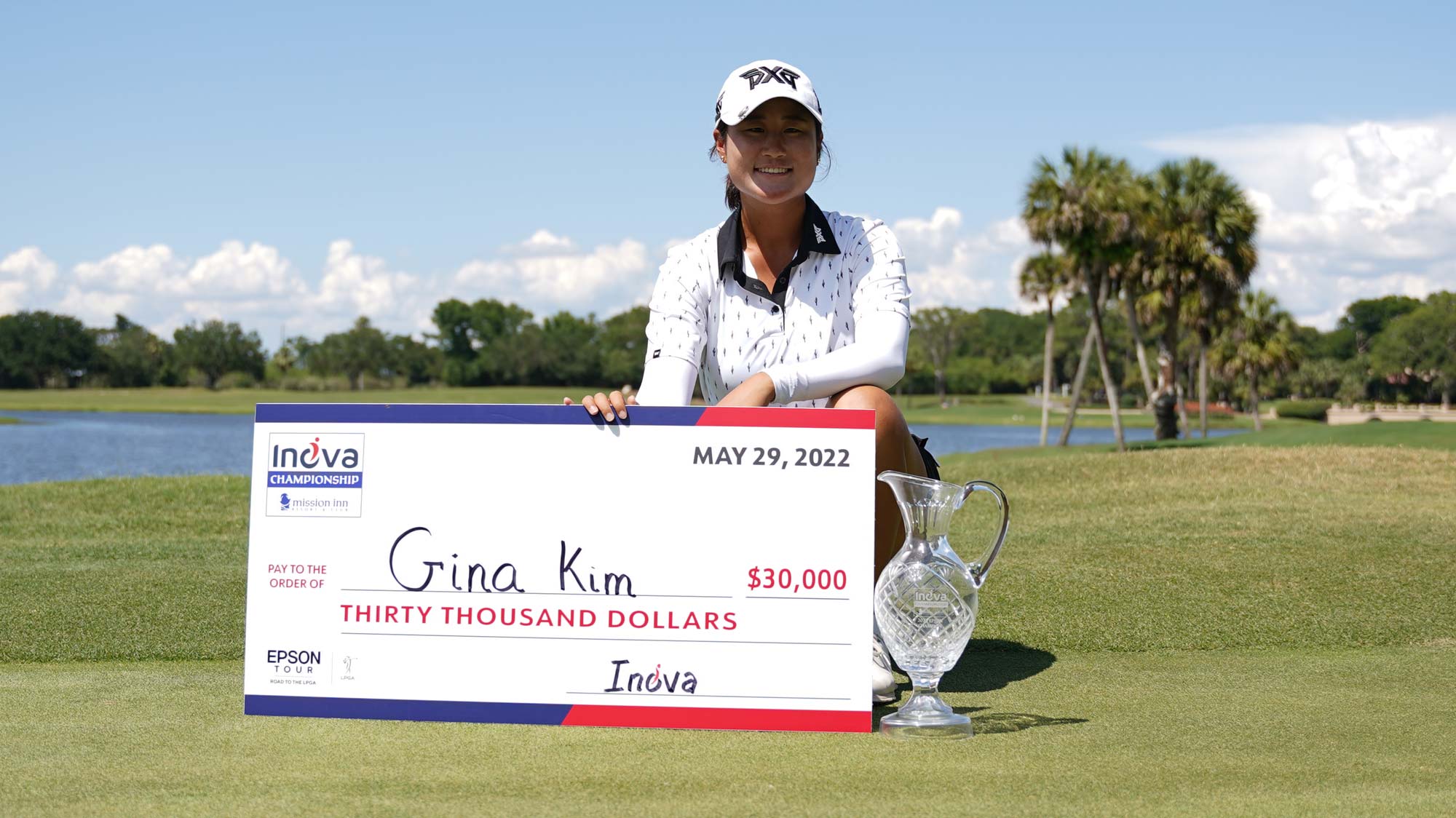 Gina Kim with the trophy after winning the Inova Mission Inn Resort and Club Championship