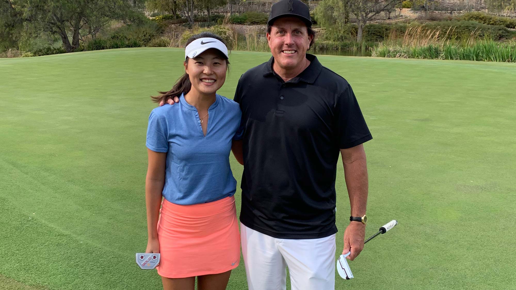 Sandy Choi and Phil Mickelson