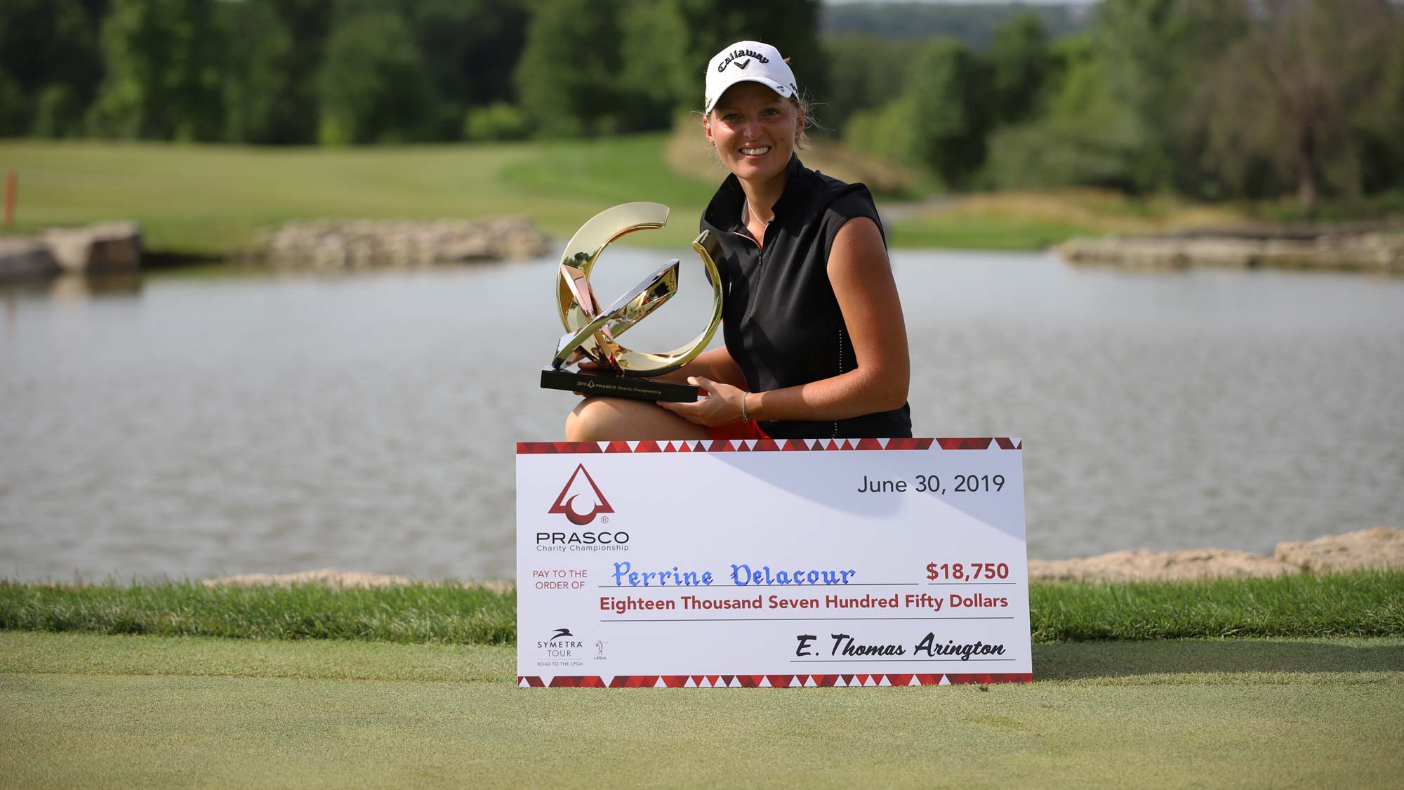 Perrine Delacour with check and trophy