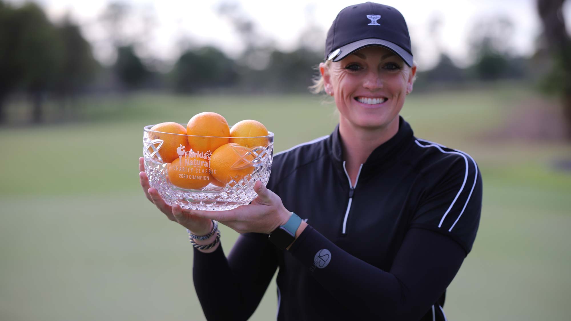 Janie Jackson holds trophy