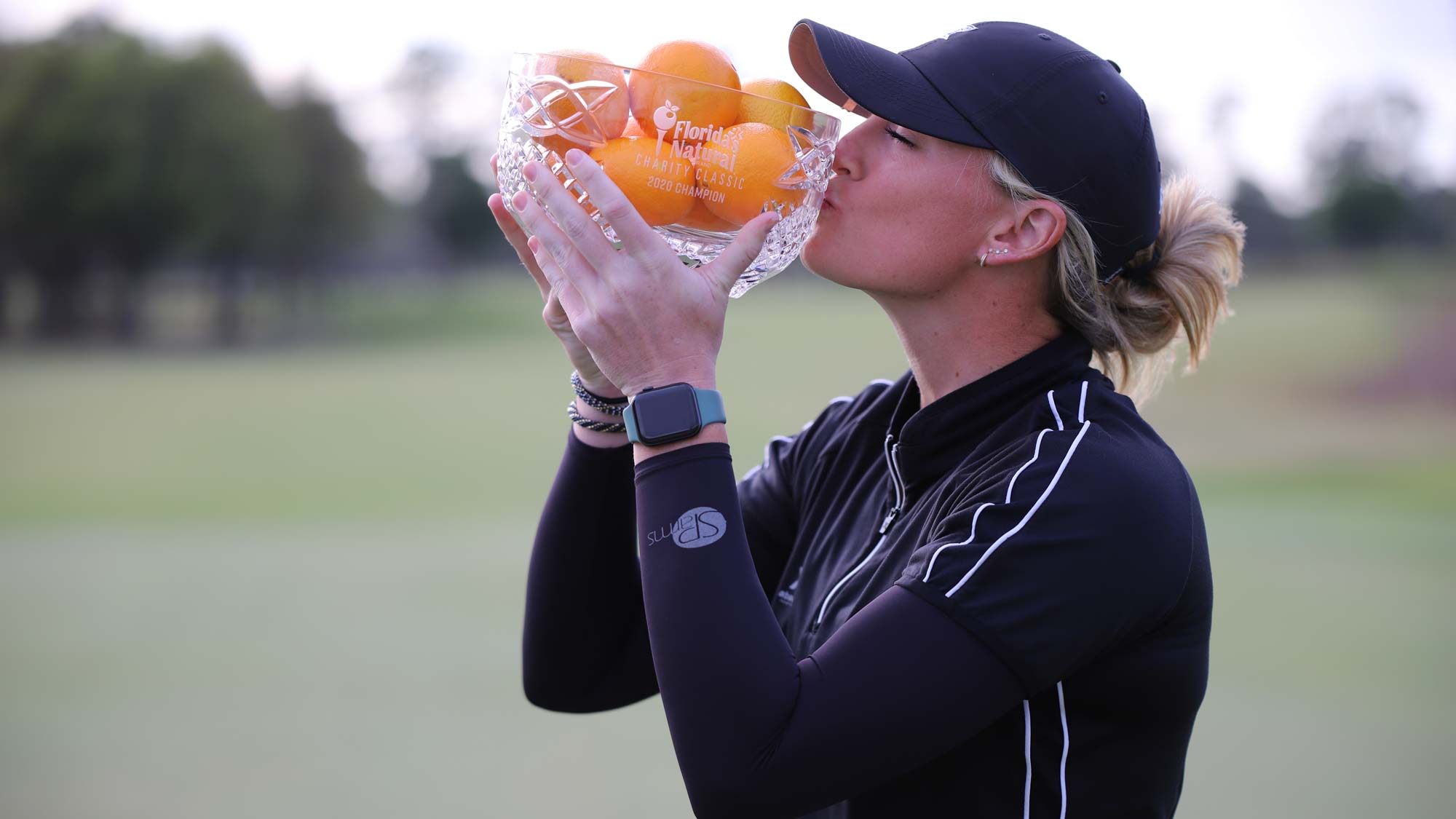 Janie Jackson Kisses Trophy